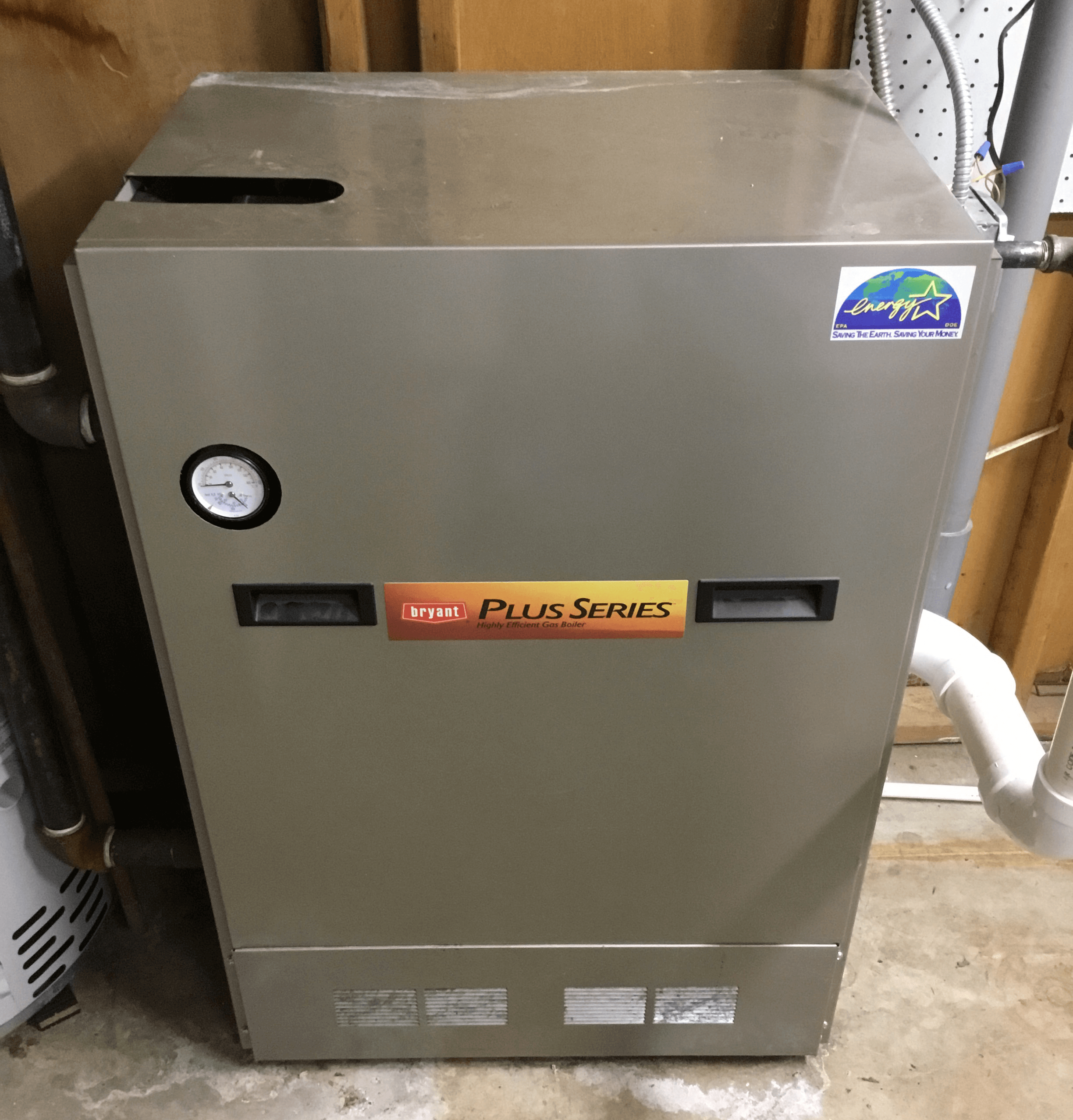 Image of old boiler, removed from a Toledo Ohio area basement. Maumee Valley Heating & Air Conditioning replaced this old boilder with an efficient new Bryant gas furnace.