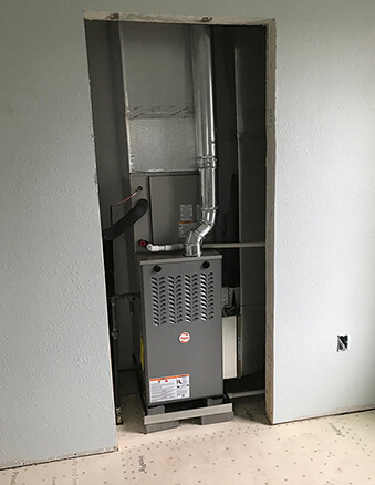 Gas furnace installed in a newly constructed home by Maumee Valley Heating and Air Conditioning.